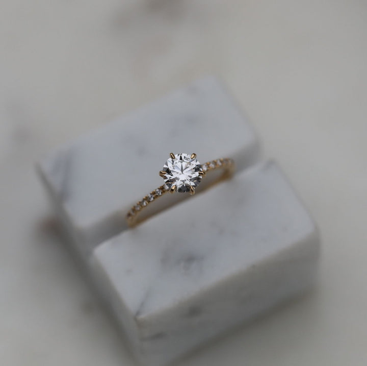 round solitaire engagement ring,