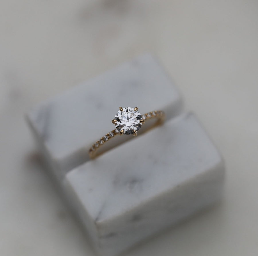 round solitaire engagement ring,