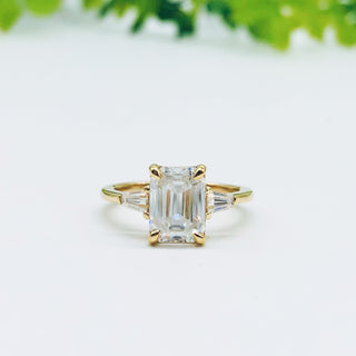 emerald-cut-three-stone-moissanite-engagement-ring