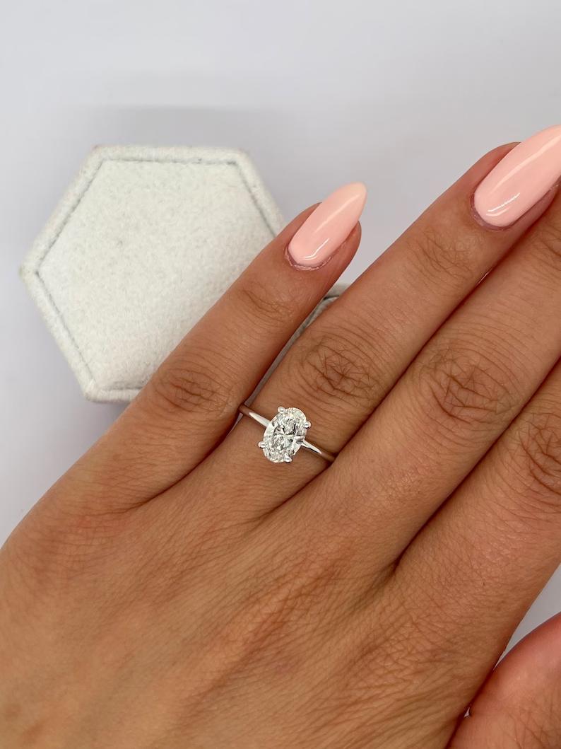 Unique solitaire engagement rings for her,

Solitaire ring vs halo ring comparison,

Best metal for solitaire diamond rings,

Oval cut solitaire engagement rings for sale,