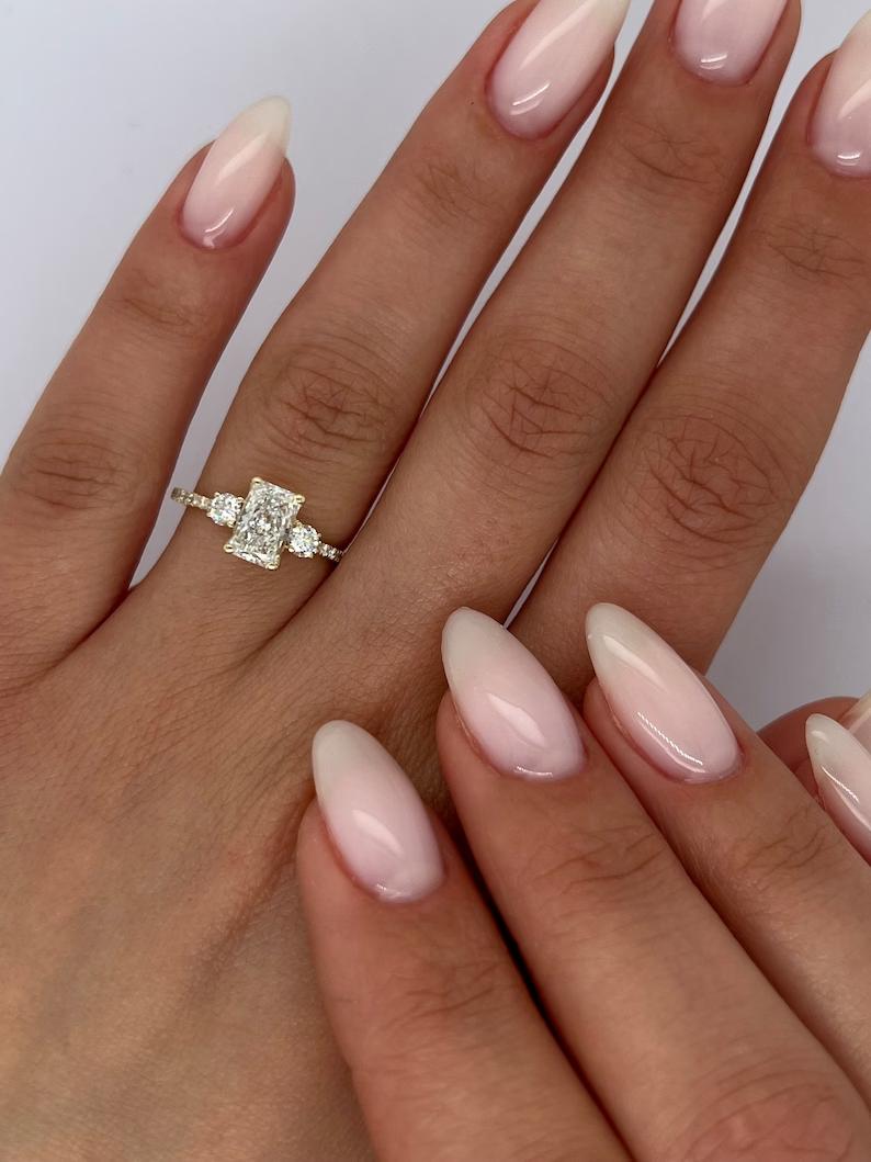 Buy three-stone engagement ring, Best three-stone engagement ring, Three-stone engagement ring for sale, Affordable three-stone diamond rings, Shop three-stone engagement rings, 