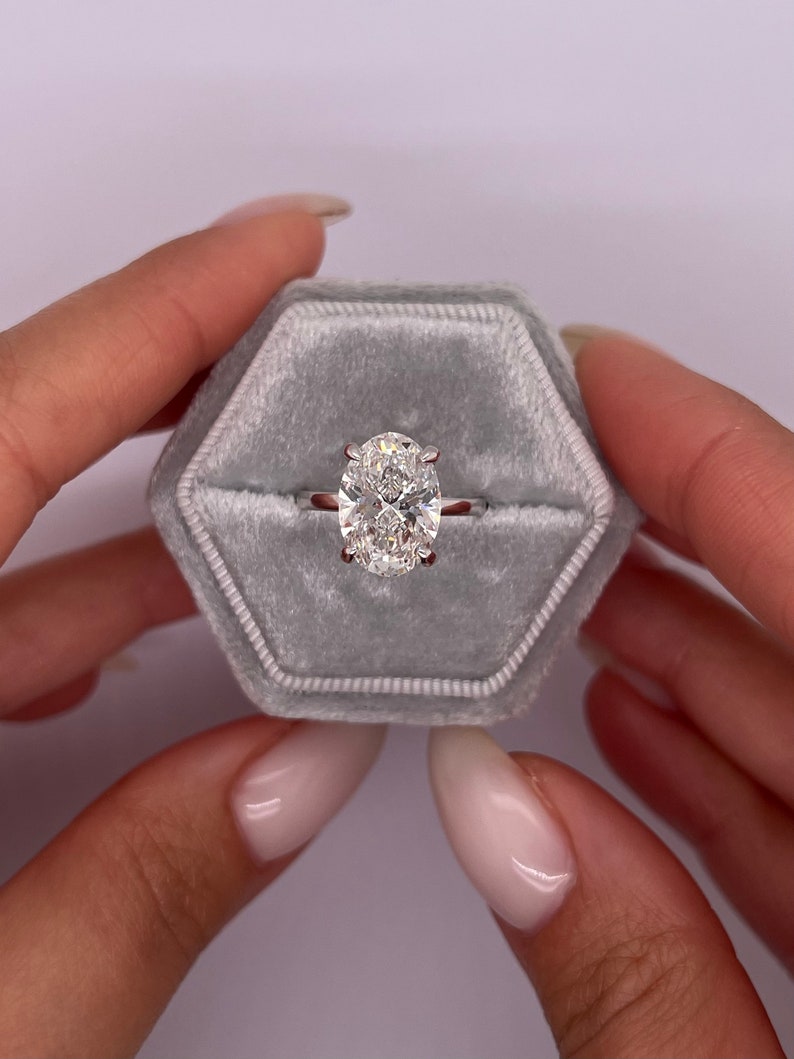 Oval channel set engagement ring, Oval swirl engagement ring, Oval unique engagement ring, Oval traditional engagement ring, Oval contemporary engagement ring, Oval minimalist engagement ring,