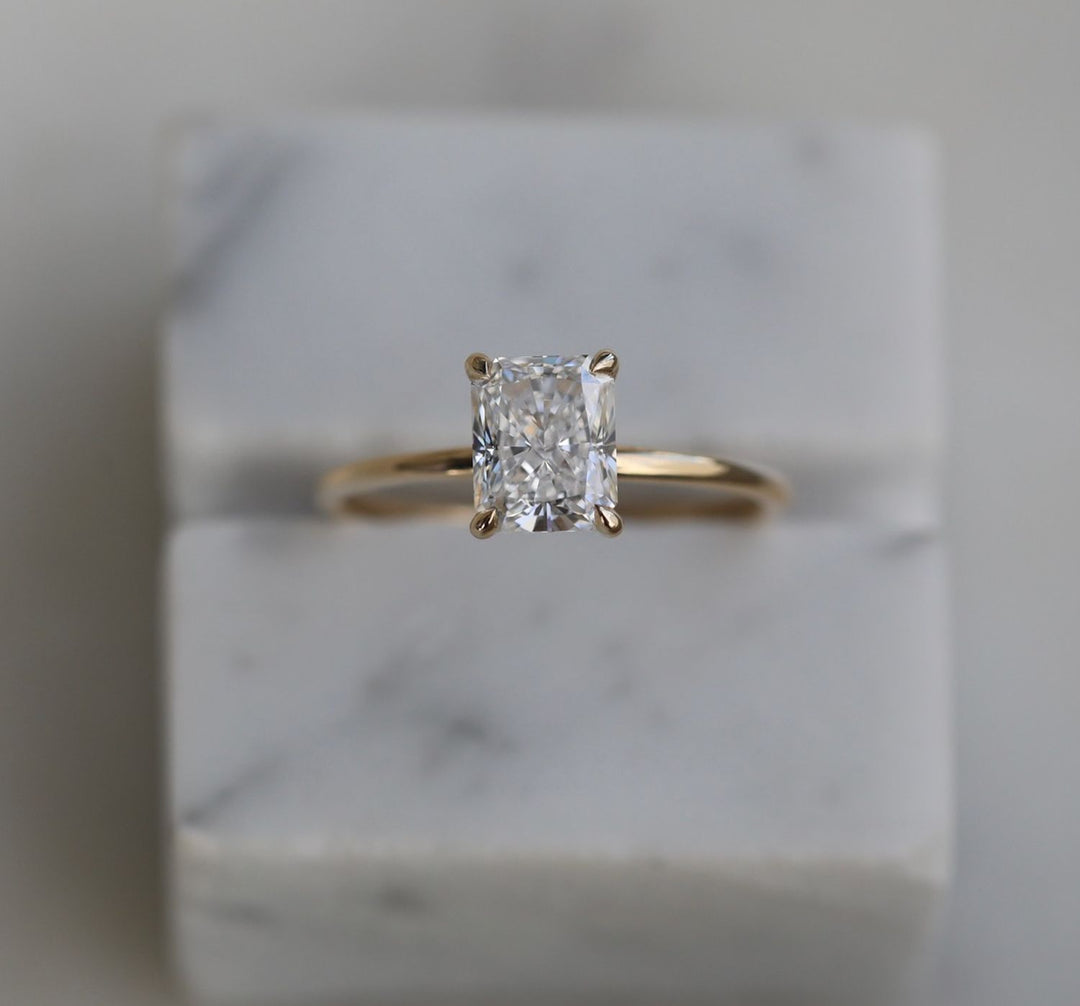 radiant solitaire engagement ring,