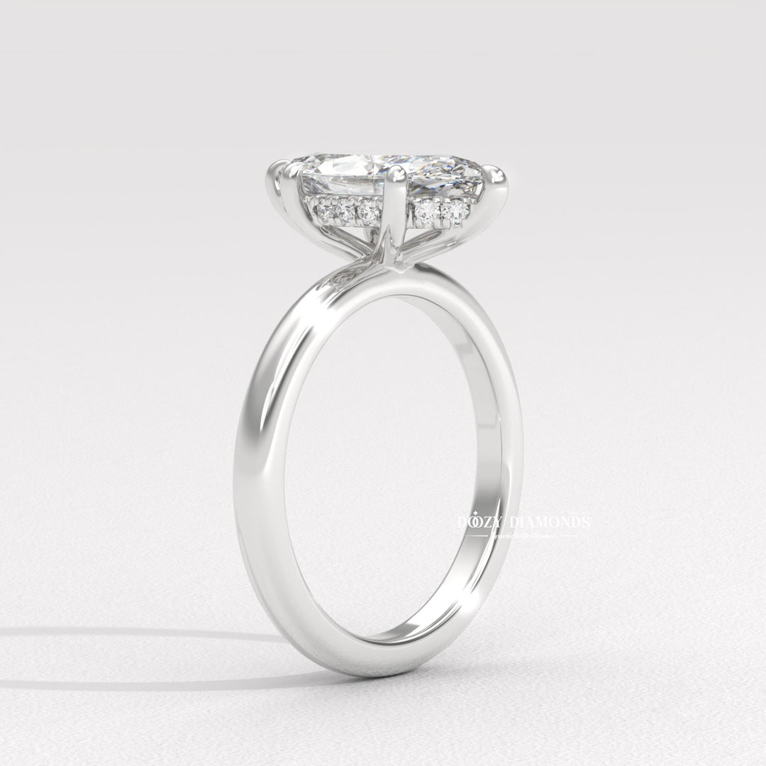 Rose gold marquise diamond ring
Solitaire with hidden halo
Elongated marquise cut ring
Pointed marquise diamond ring
