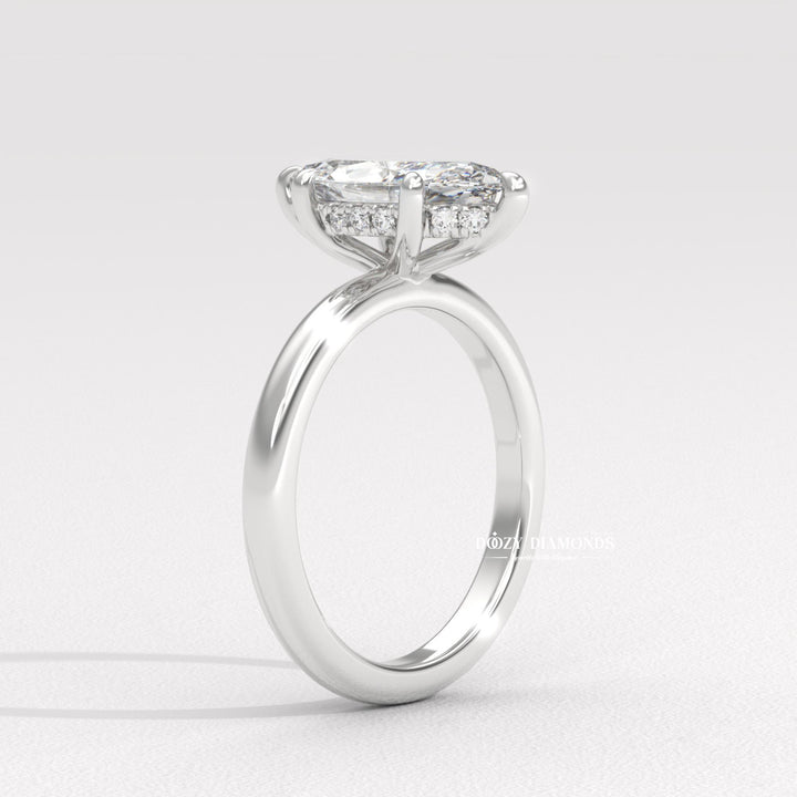 Rose gold marquise diamond ring
Solitaire with hidden halo
Elongated marquise cut ring
Pointed marquise diamond ring