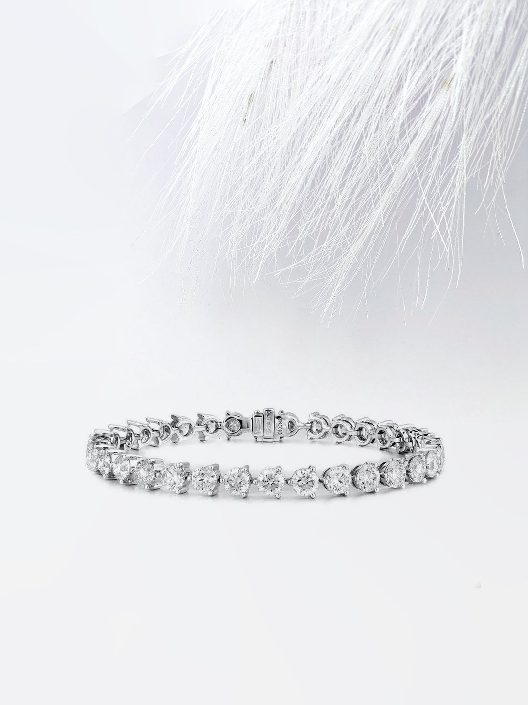Round Cut Moissanite Diamond Tennis Bracelet In 18K White Gold