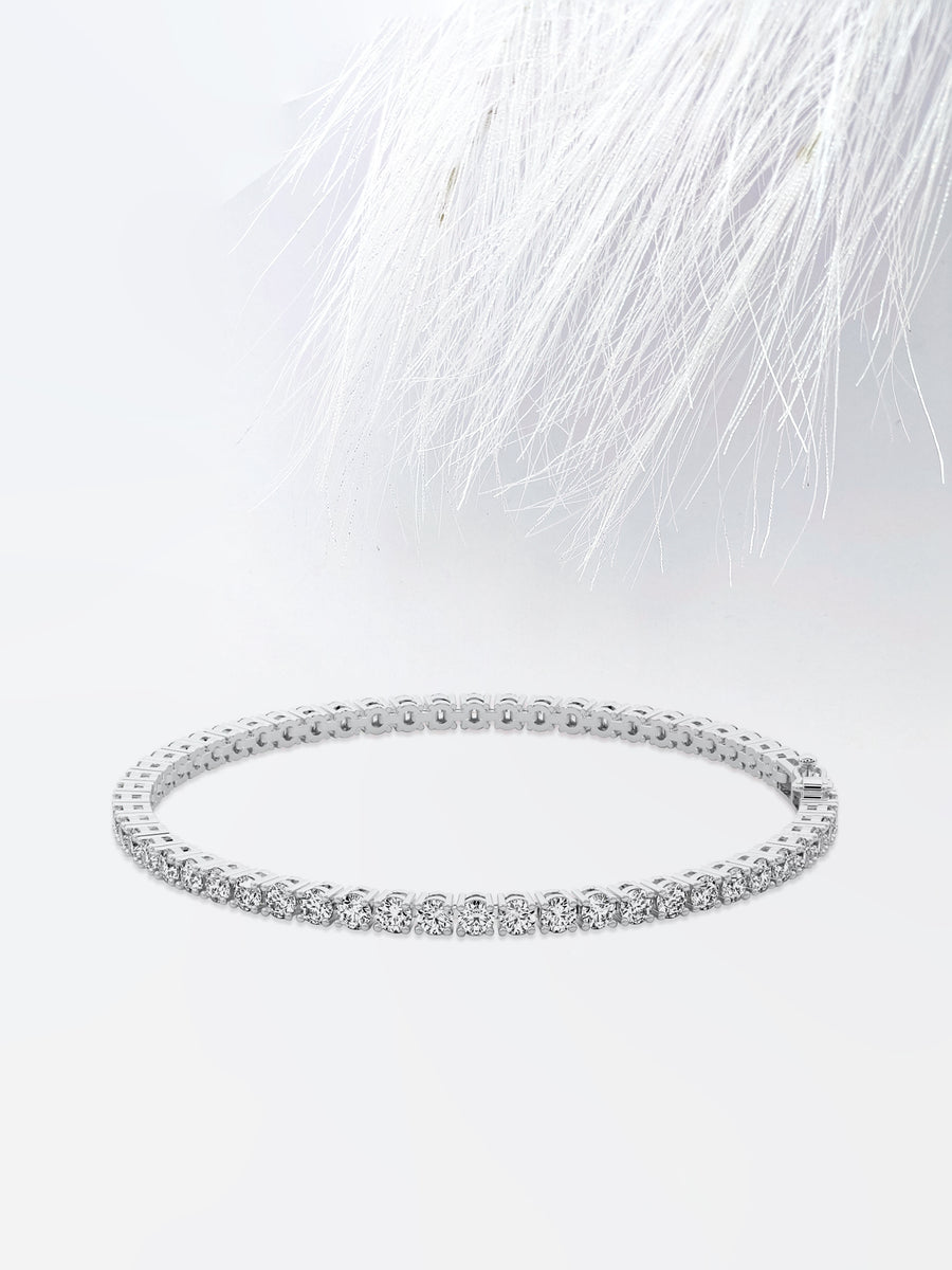 Round Cut Moissanite Diamond Tennis Bracelet In 14K White Gold