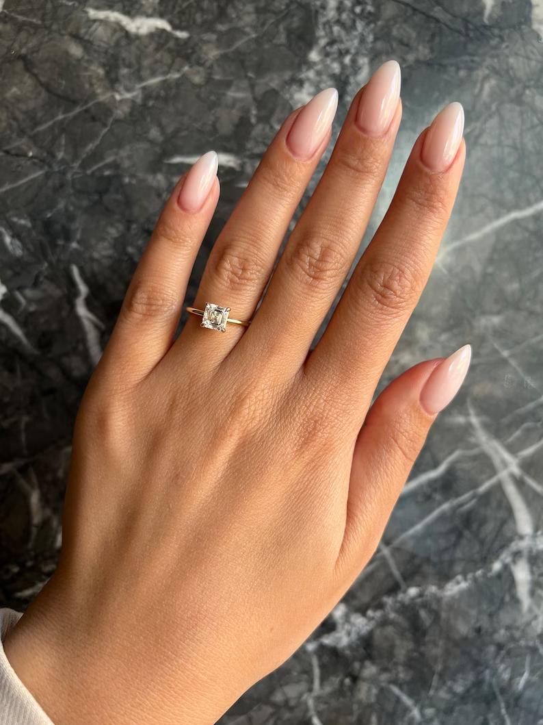 Solitaire diamond ring in white gold,

Unique solitaire engagement rings for her,

Solitaire ring vs halo ring comparison,