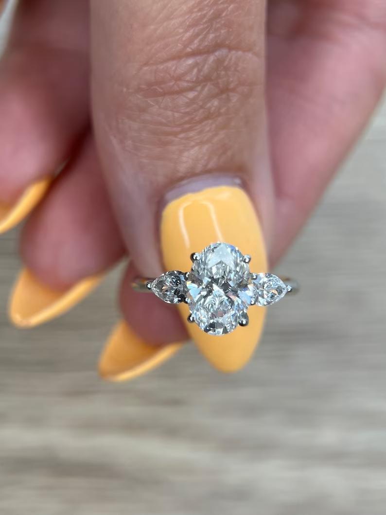 Buy three-stone engagement ring, Best three-stone engagement ring, Three-stone engagement ring for sale, Affordable three-stone diamond rings, Shop three-stone engagement rings, Three-stone ring price, Custom three-stone engagement rings, Three-stone diamond ring near me,