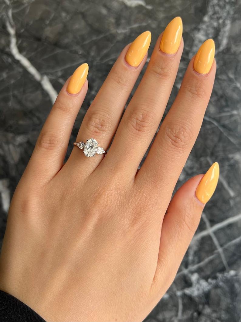Three-stone rings with financing, Three-stone moissanite engagement ring, Three-stone ring in 14K gold, Buy princess cut three-stone ring, Oval cut three-stone engagement ring, Exclusive three-stone diamond rings, GIA certified three-stone rings, 