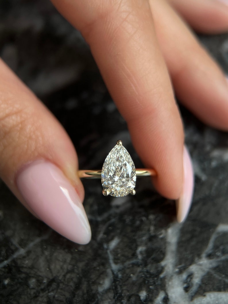 Pear cut diamond ring, Pear shaped diamond ring, Pear diamond engagement ring, Pear solitaire diamond ring, Pear halo diamond ring, Pear pave diamond ring, Pear vintage diamond ring, 