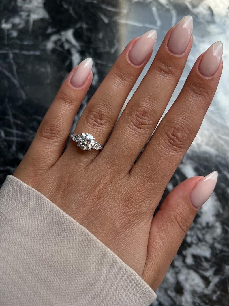 Round side stone engagement ring, Round cathedral engagement ring, Round bezel engagement ring, Round tension set engagement ring, Round split shank engagement ring, Round channel set engagement ring, Round unique engagement ring