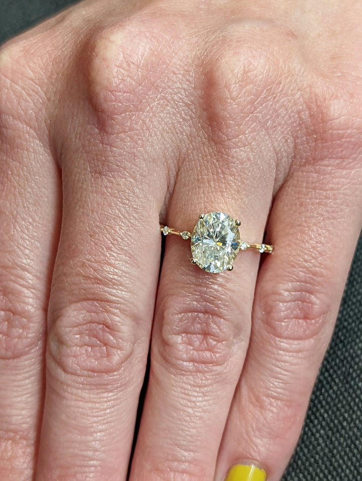 Luxury oval diamond ring with petite pave setting