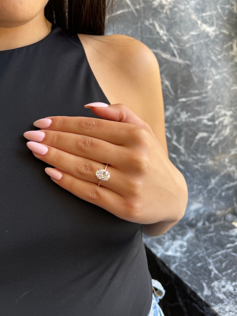 Princess cut solitaire diamond engagement ring,

Solitaire engagement rings with hidden halo,

Solitaire ring price guide and buying tips,

Vintage solitaire diamond rings for brides,

Emerald cut solitaire diamond engagement rings