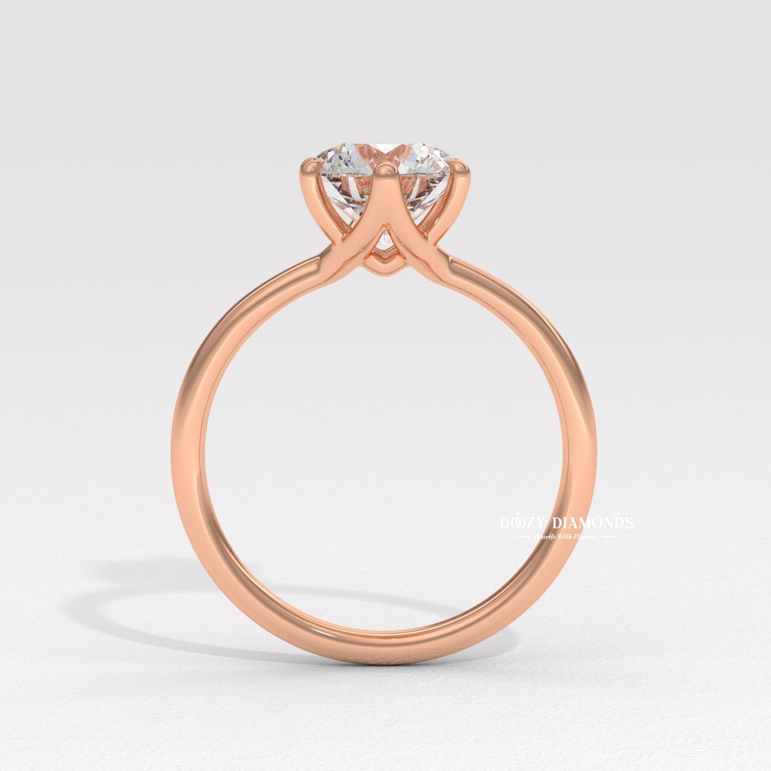 20. Sustainable Luxury Diamond Ring
21. Sculptural Setting White Gold Ring
22. Hidden Detail Solitaire Ring