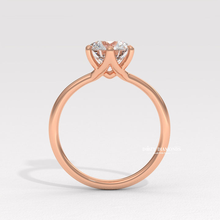 20. Sustainable Luxury Diamond Ring
21. Sculptural Setting White Gold Ring
22. Hidden Detail Solitaire Ring