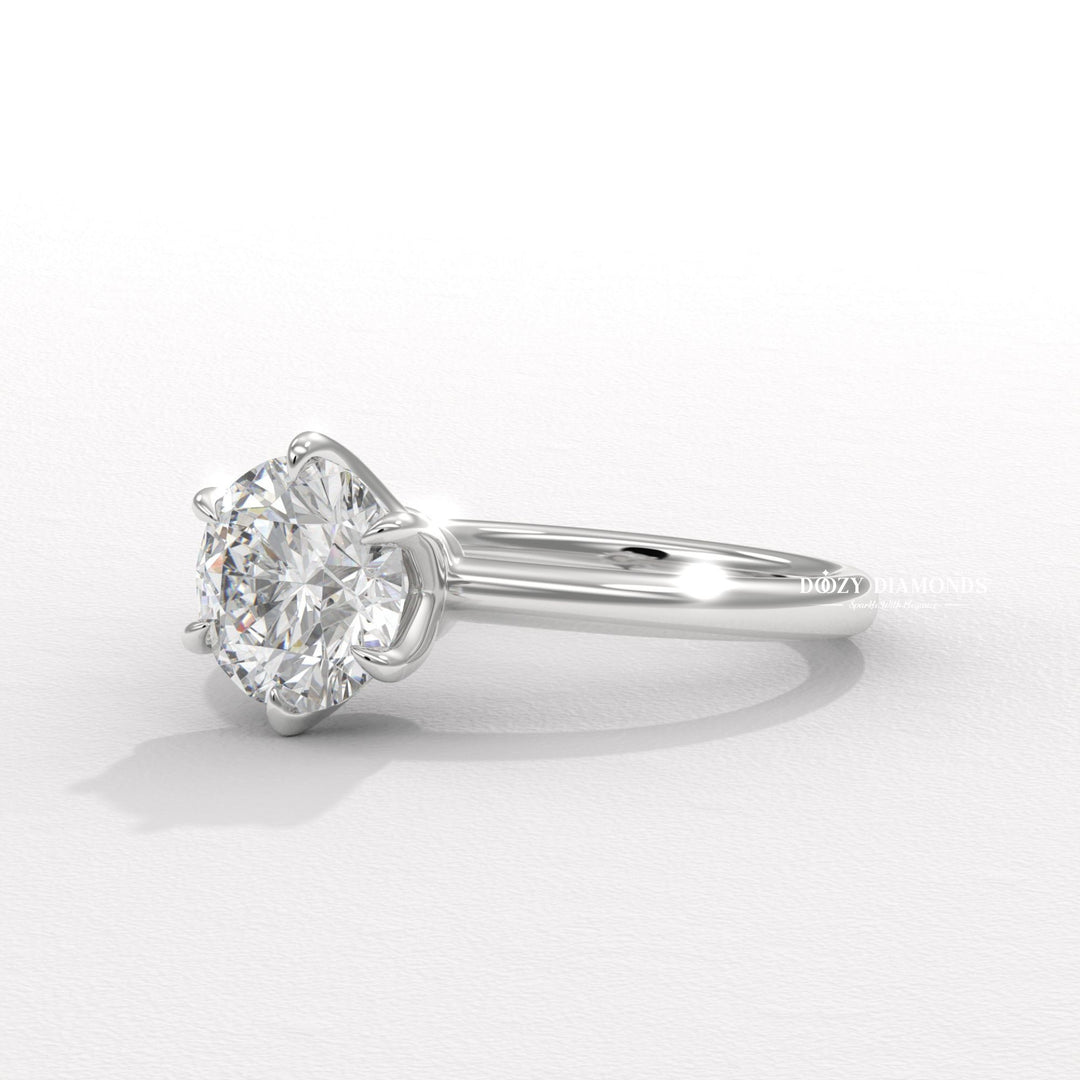 15. 4 Prong Solitaire Setting
16. Platinum Round Solitaire Ring
17. White Gold Round Solitaire Ring