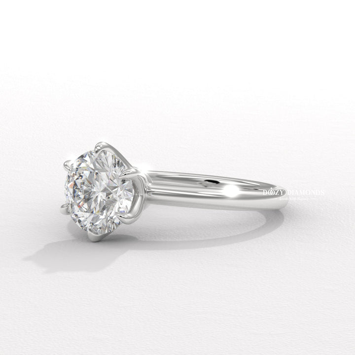 15. 4 Prong Solitaire Setting
16. Platinum Round Solitaire Ring
17. White Gold Round Solitaire Ring