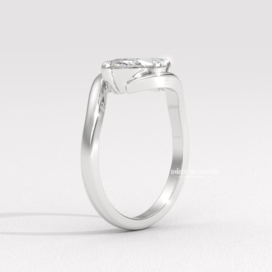 23. Handcrafted White Gold Diamond Ring
24. Engagement Ring for Modern Bride
25. Conflict-Free Round Diamond Ring