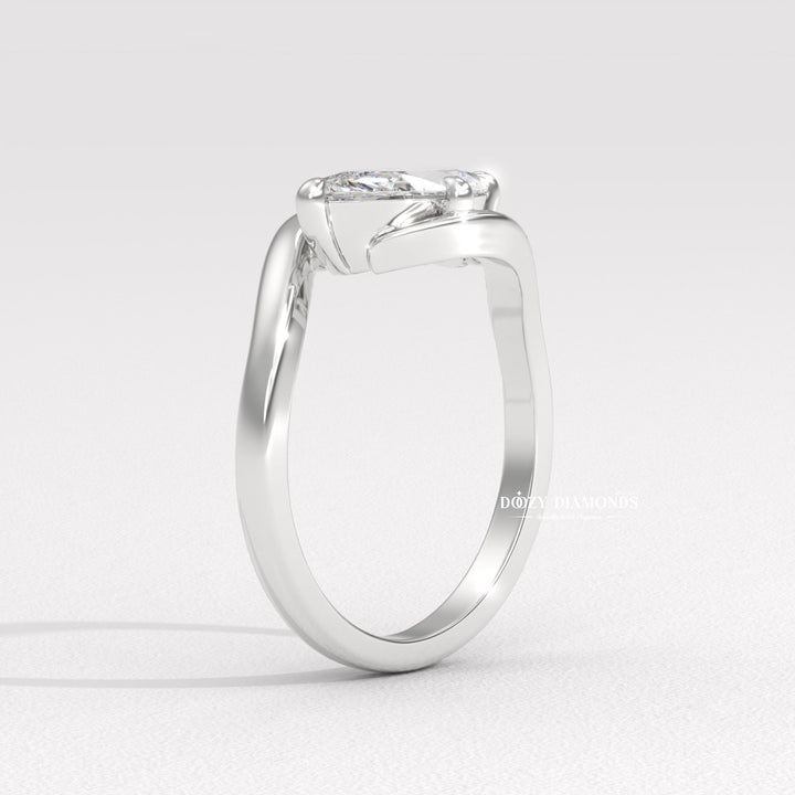 23. Handcrafted White Gold Diamond Ring
24. Engagement Ring for Modern Bride
25. Conflict-Free Round Diamond Ring