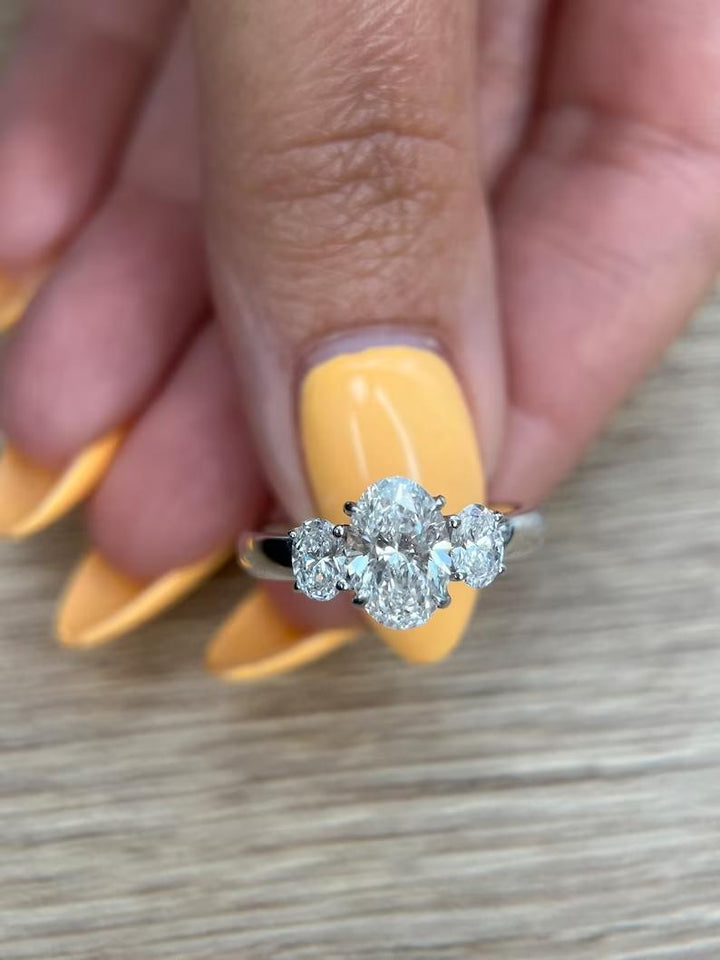 GIA certified three-stone rings, Three-stone engagement rings under $2000, Buy three-stone ring with matching band, Discounted three-stone engagement rings,