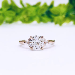 round-cut-cluster-moissanite-engagement-ring