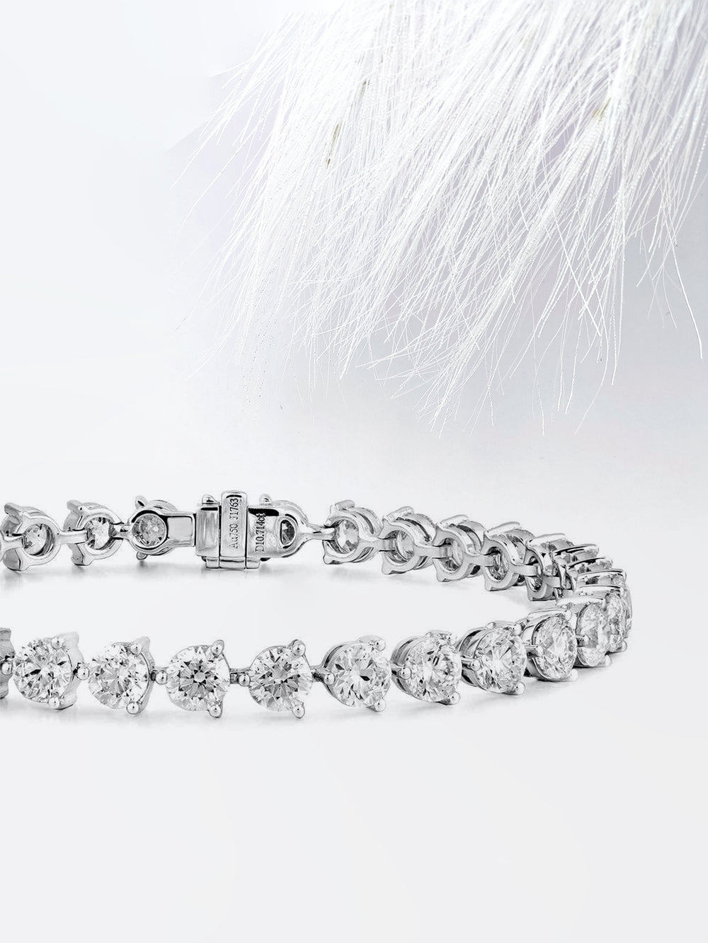 Round Cut Moissanite Diamond Tennis Bracelet In 18K White Gold