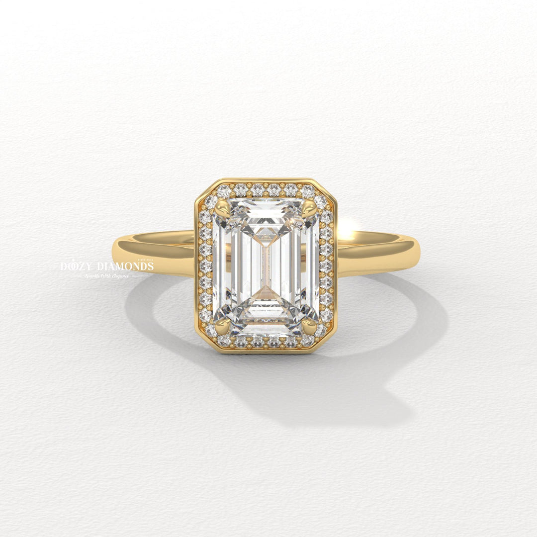 2 carat emerald engagement ring (if applicable)
Step cut engagement ring
Rectangular diamond ring