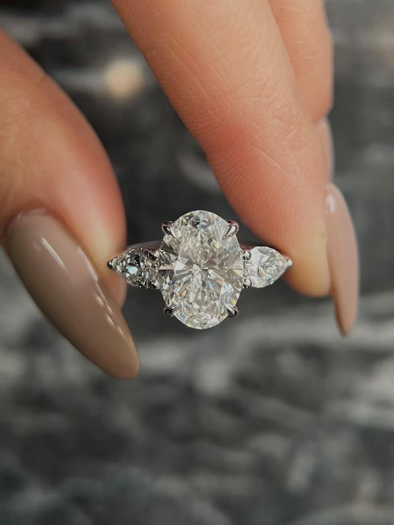 Oval cut three-stone engagement ring, Exclusive three-stone diamond rings, GIA certified three-stone rings, Three-stone engagement rings under $2000, 