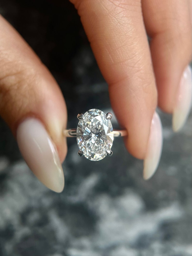 Oval side stone engagement ring, Oval cathedral engagement ring, Oval bezel engagement ring, Oval tension set engagement ring, Oval split shank engagement ring, 