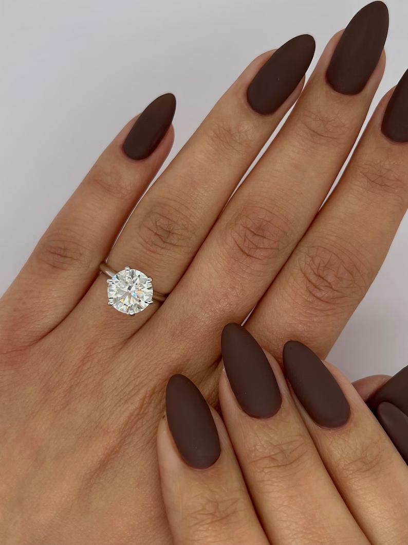 Round three-stone engagement ring, Round side stone engagement ring, Round cathedral engagement ring, Round bezel engagement ring, Round tension set engagement ring