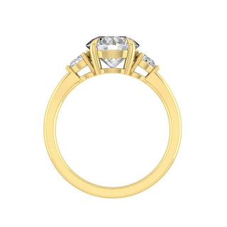 round-cut-three-stone-moissanite-engagement-ring