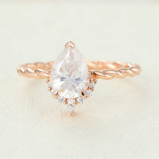 pear-shaped-moissanite-cluster-engagement-ring