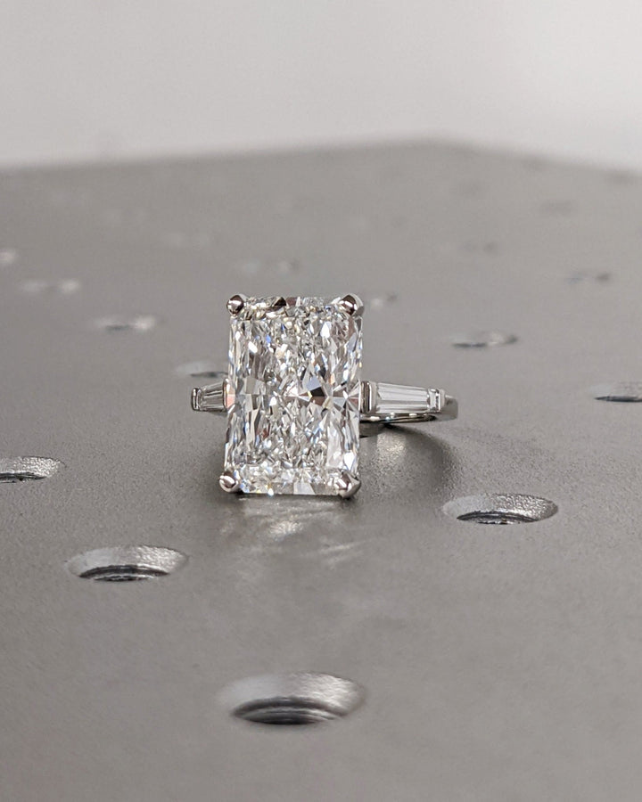 Radiant diamond trilogy ring with brilliant sparkle