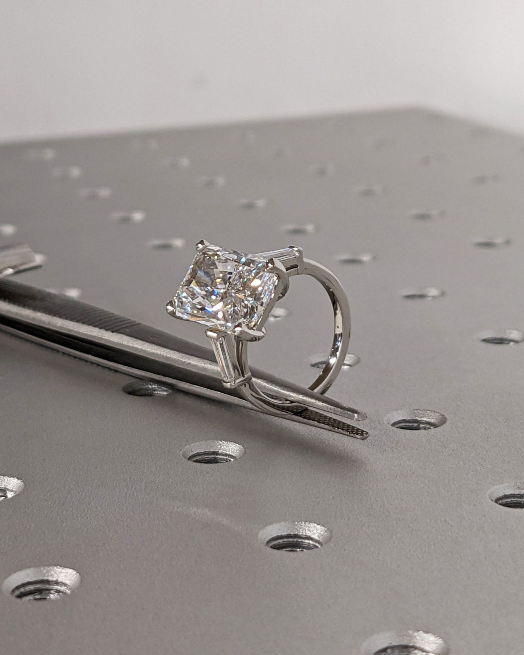 Luxury bridal ring with radiant lab diamond centerpiece
