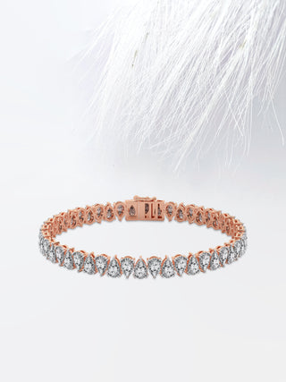 Pear Cut Moissanite Diamond Tennis Bracelet In 14K Rose Gold