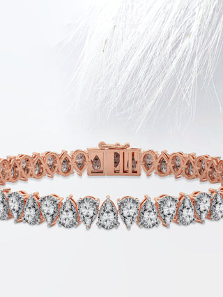 Pear Cut Moissanite Diamond Tennis Bracelet In 14K Rose Gold