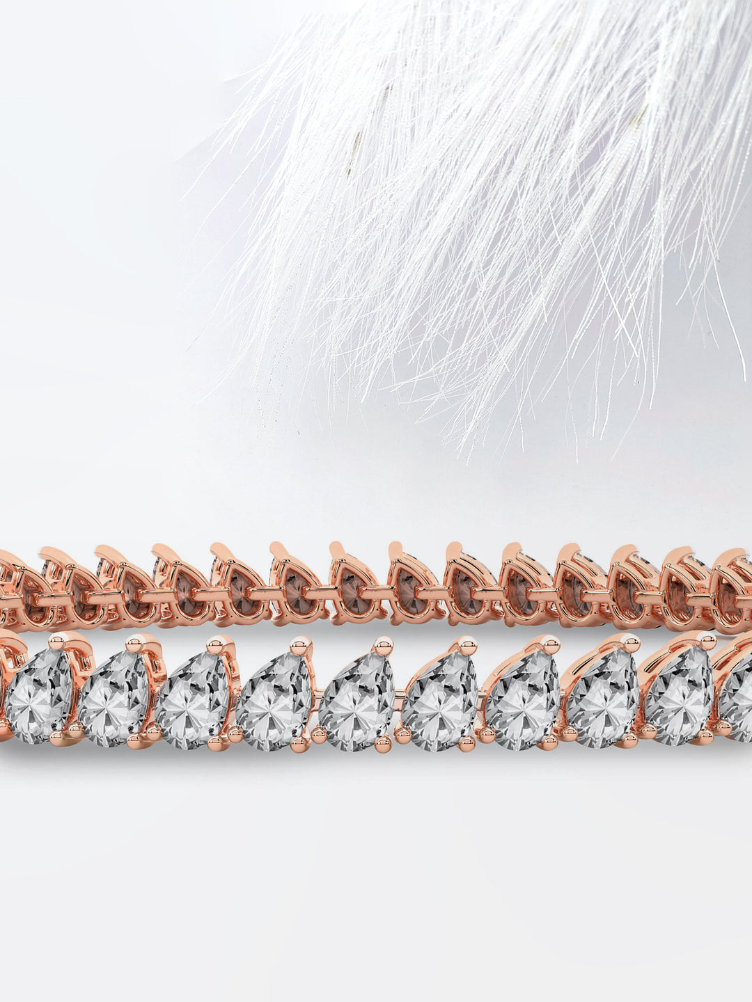 Pear Cut Moissanite Diamond Bezel Set Tennis Bracelet In 14K Rose Gold