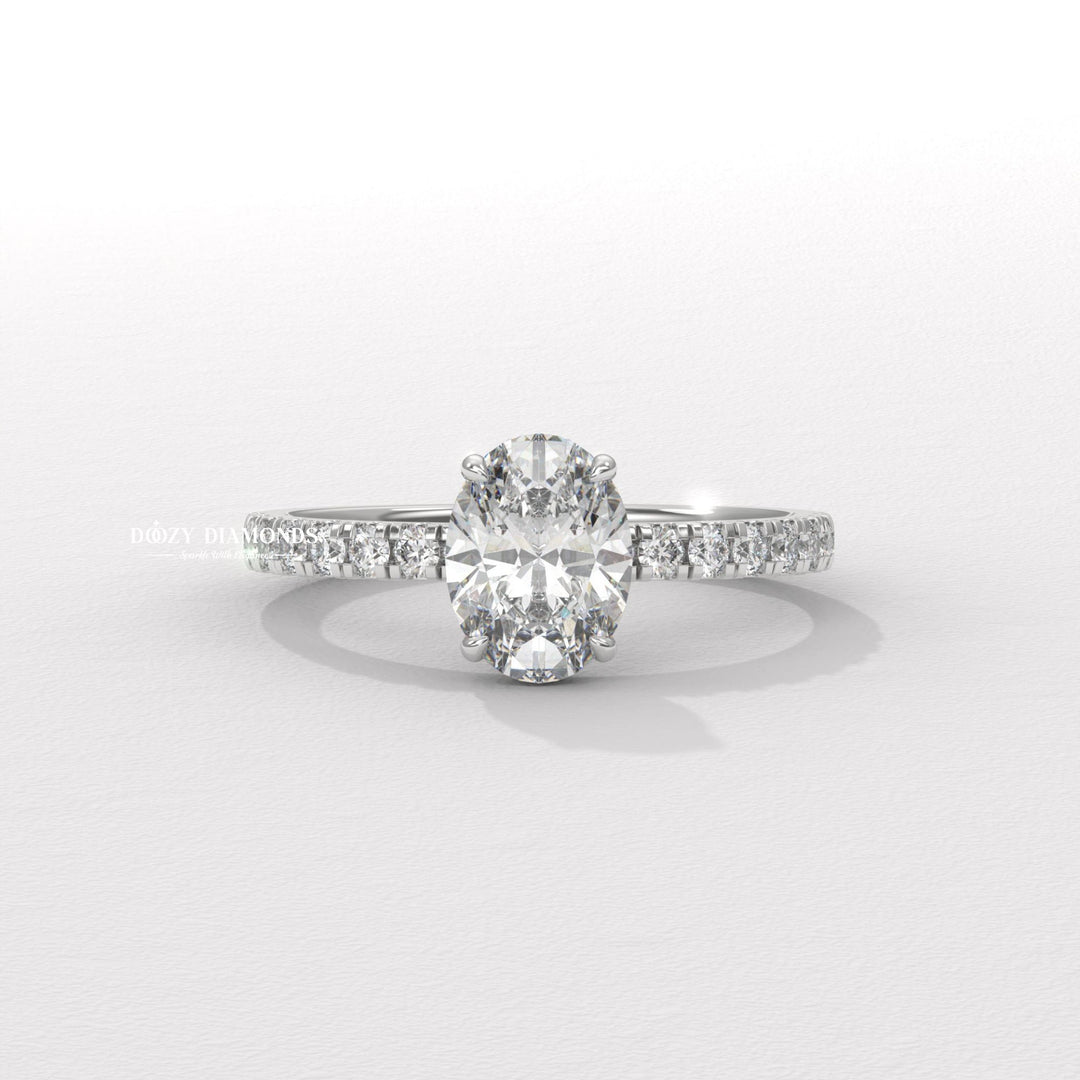 Modern oval engagement ring
Classic oval ring with a twist
Pavé hidden halo oval ring
Under halo engagement rin