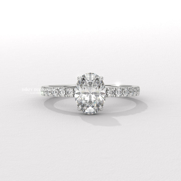 Modern oval engagement ring
Classic oval ring with a twist
Pavé hidden halo oval ring
Under halo engagement rin