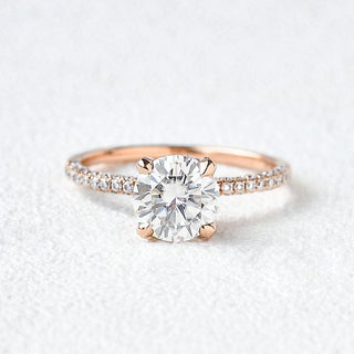 round-cut-solitaire-pave-moissanite-engagement-ring