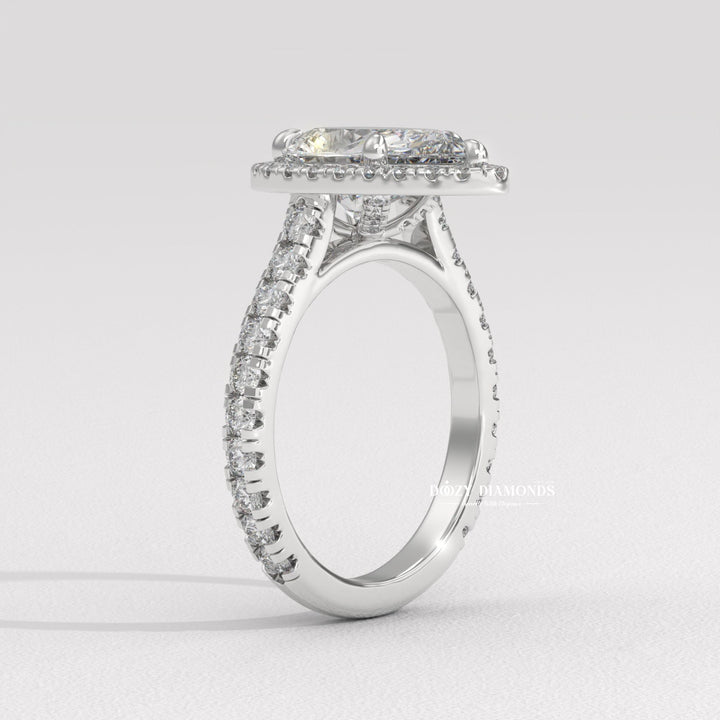 Elongated radiant cut ring
Modern engagement ring
Classic halo ring
Diamond halo setting