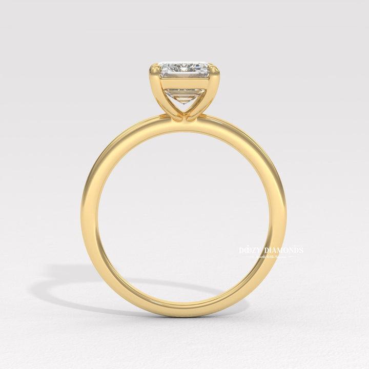 hall of mirrors diamond, elongated diamond ring, solitaire engagement jewelry, premium emerald diamond, elegant step cut ring, timeless emerald solitaire, bridal diamond accessory,
