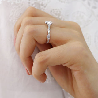 oval-shaped-moissanite-solitaire-twisted-style-engagement-ring