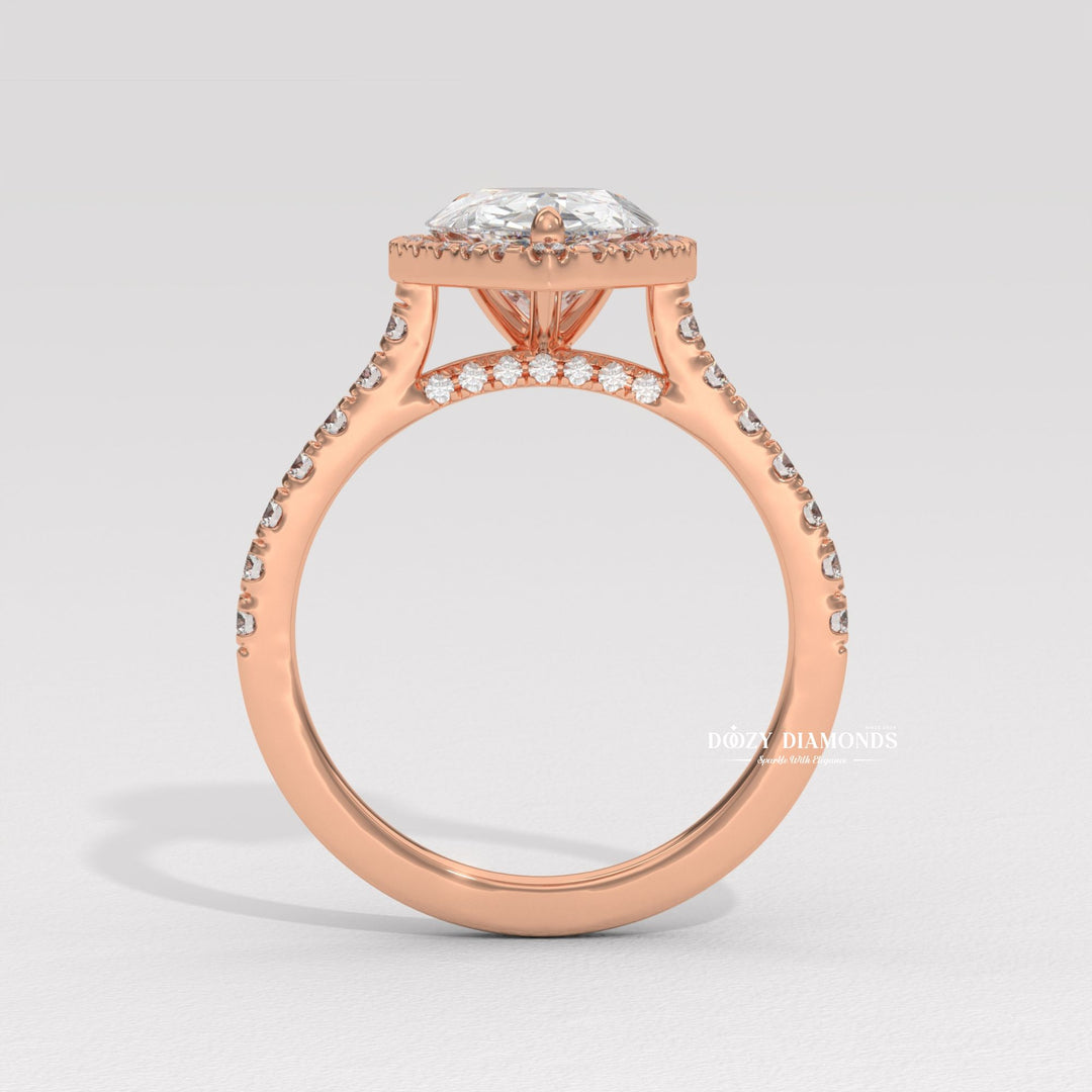 Classic pear engagement ring
Unique pear engagement ring
Diamond halo setting
Pave setting pear ring