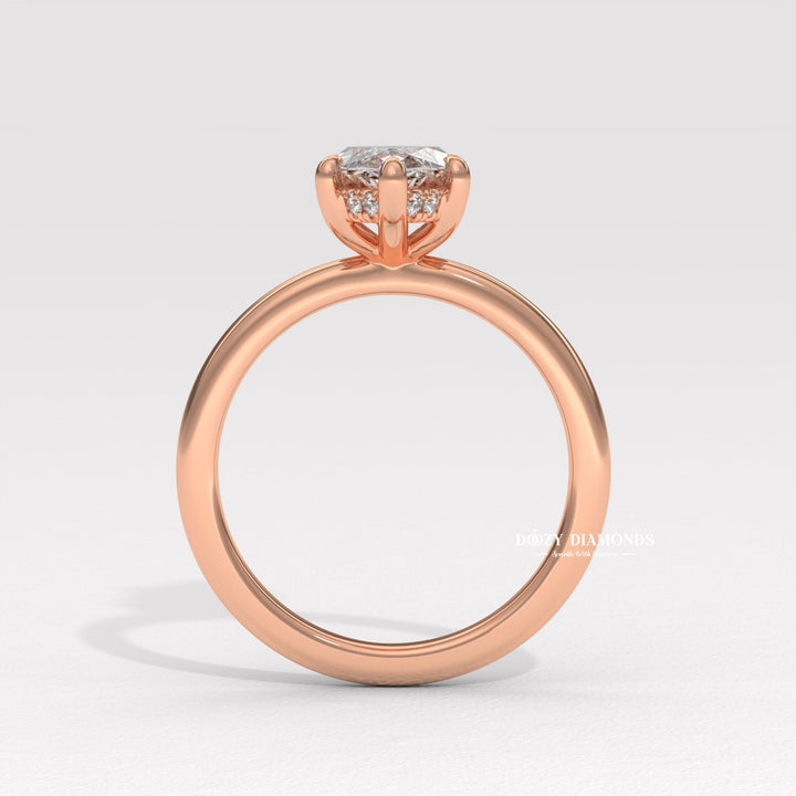 Modern engagement ring styles
Diamond ring for women
Marquise cut ring hidden halo
Marquise diamond ring
Engagement ring
Diamond ring