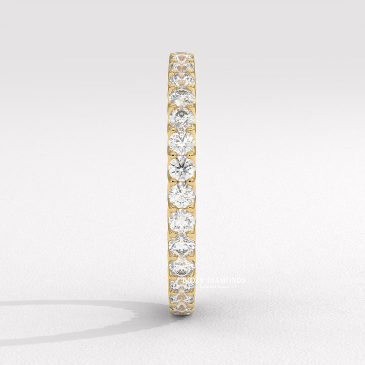 Sustainable wedding band
Ethical diamond jewelry
14k gold eternity band
18k white gold band