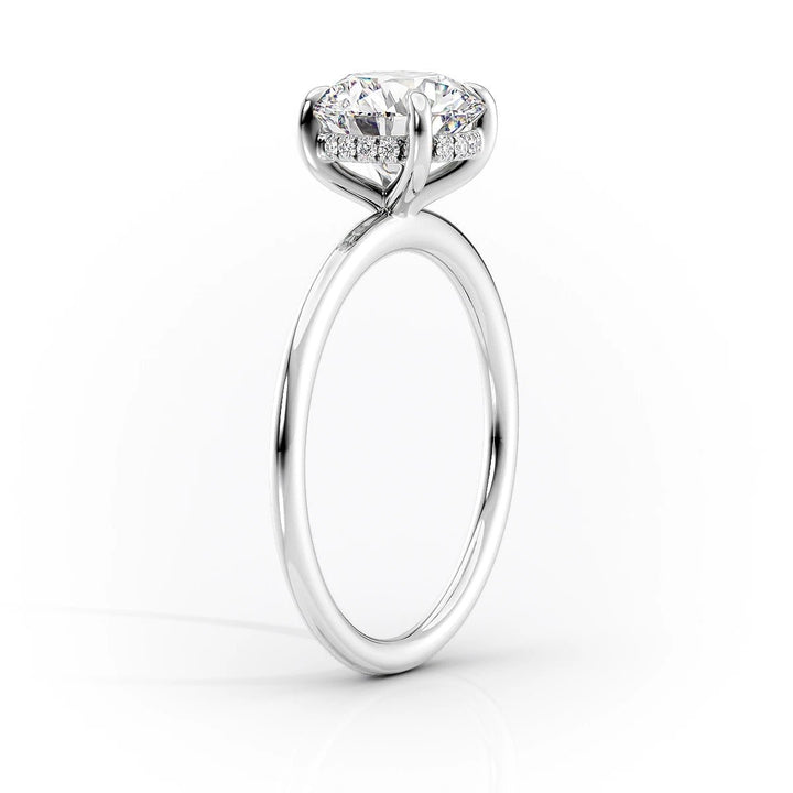 hidden halo pear diamond ring