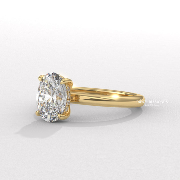 Hidden halo engagement ring
Oval solitaire with hidden halo
Modern oval engagement ring