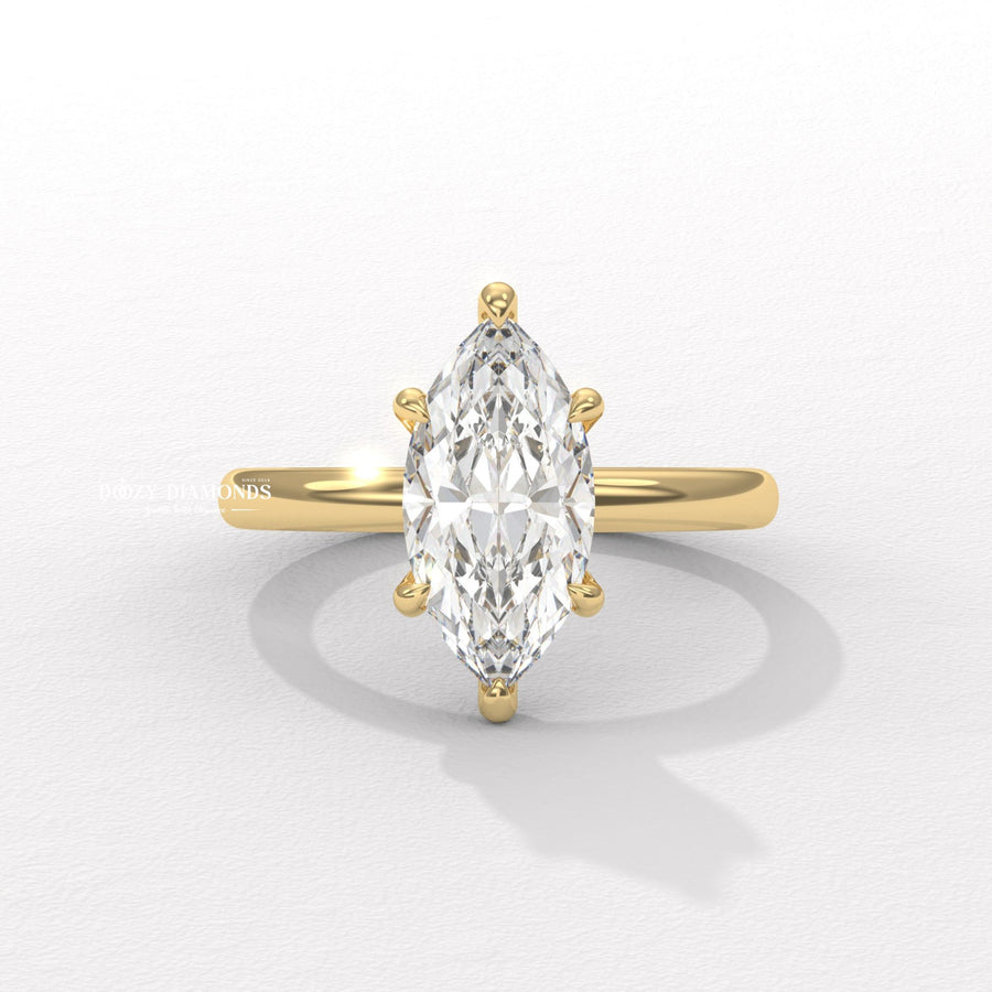 Hidden halo marquise engagement ring
Marquise solitaire diamond ring
Marquise cut engagement ring